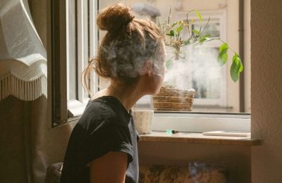 person smoking a cigarette is at risk of having a stroke